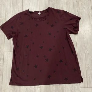 Dark purple starred distressed top